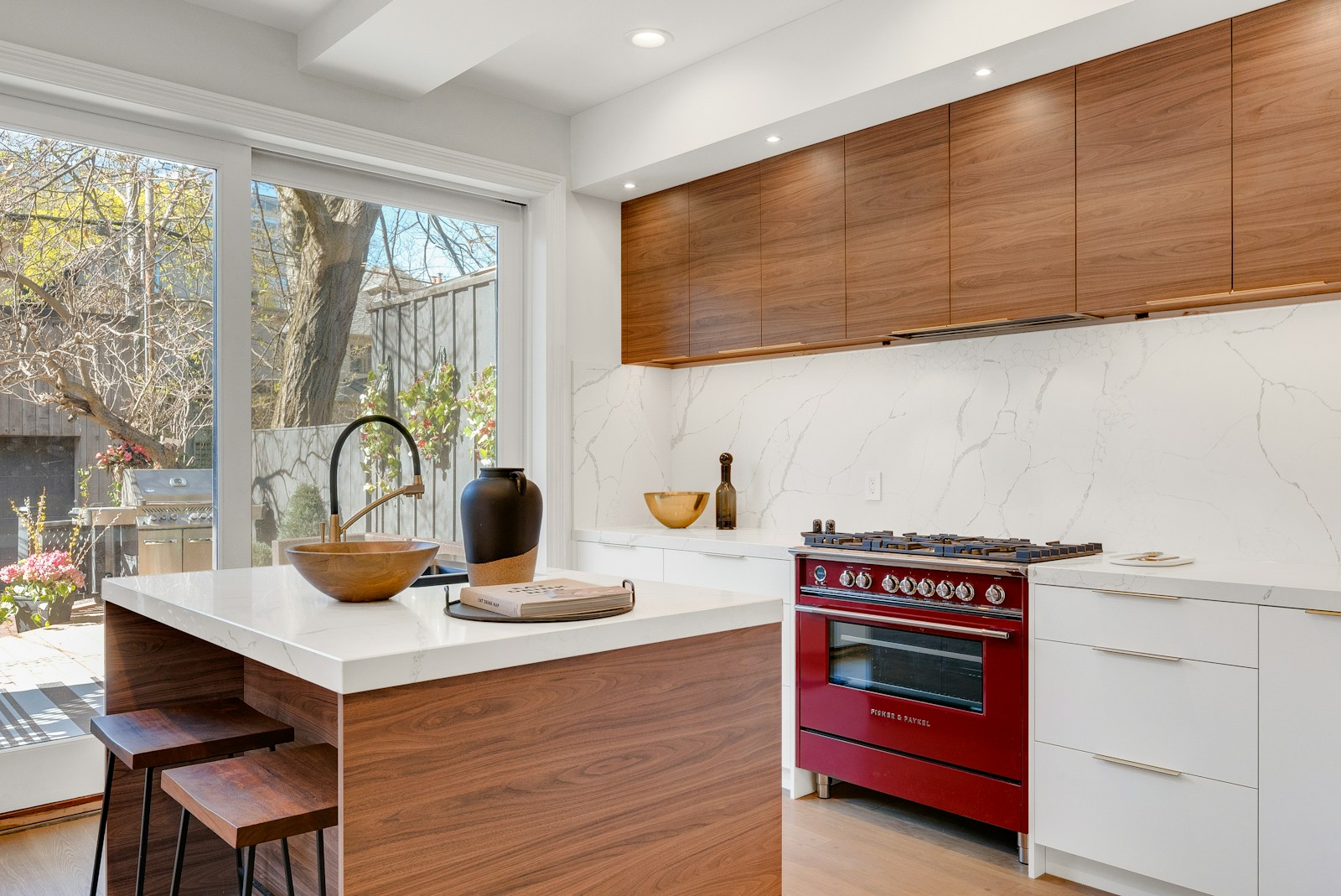 Kitchen Island Near Gas Range Beside Base Cabinets