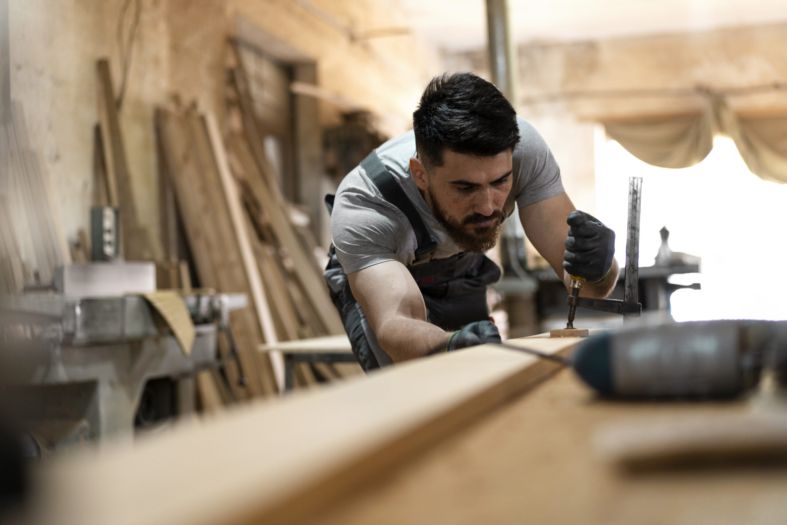 Carpenter-Cutting-Mdf-Board-Inside-Workshop